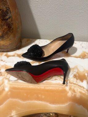 Christian Louboutin Black Leather Pointed-Toe Pom-Pom Stilettos with Red Soles